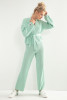 Elegant 3-piece summer set made of merino wool pants, top, and short cardigan with a belt F1191 color Green